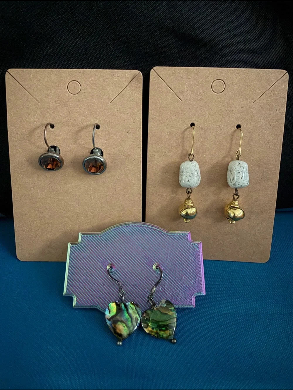 Three pairs distinct earrings